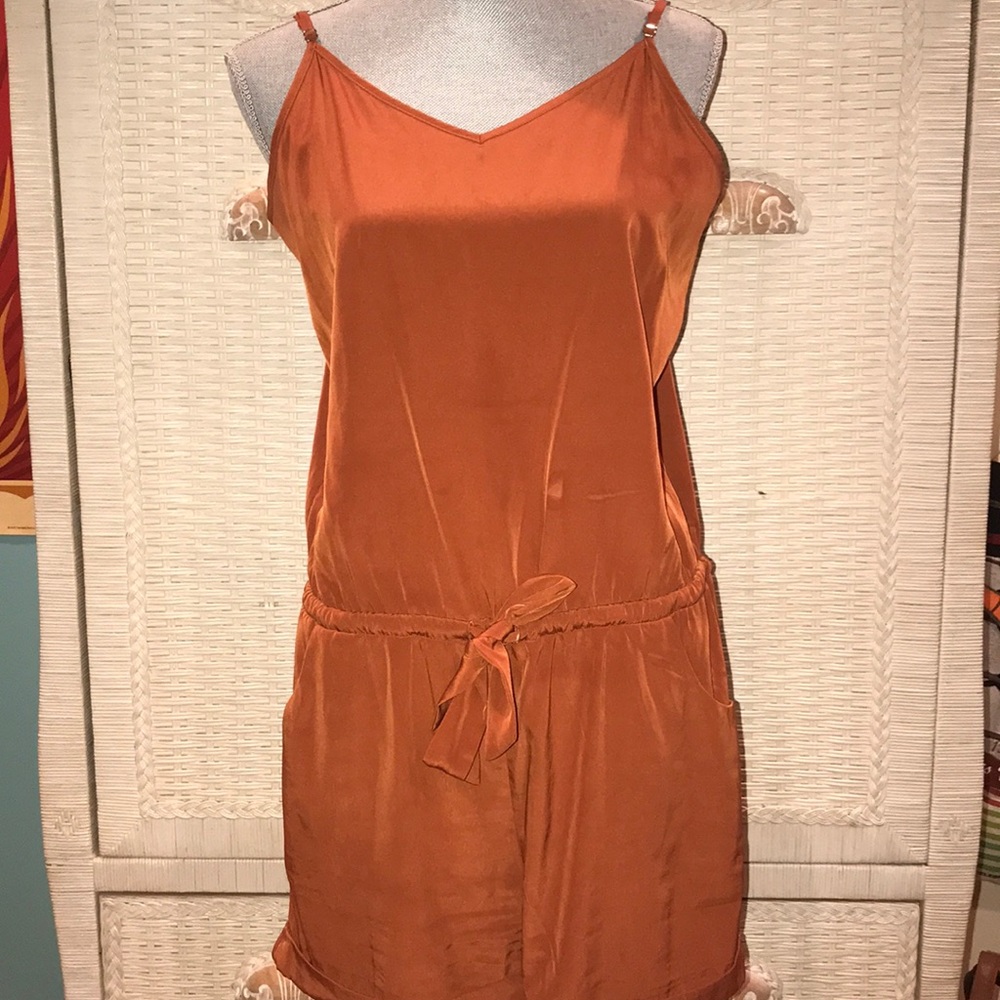 I am selling a silk like material romper